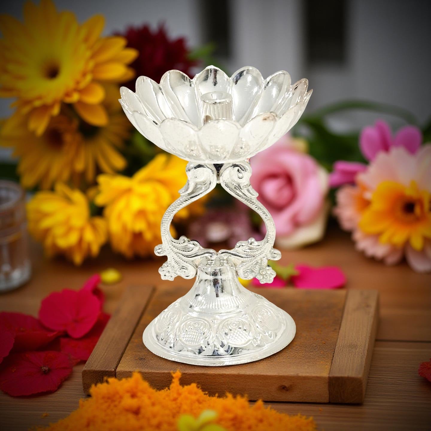 Bhagyashri Fancy Peacock Silver Diya