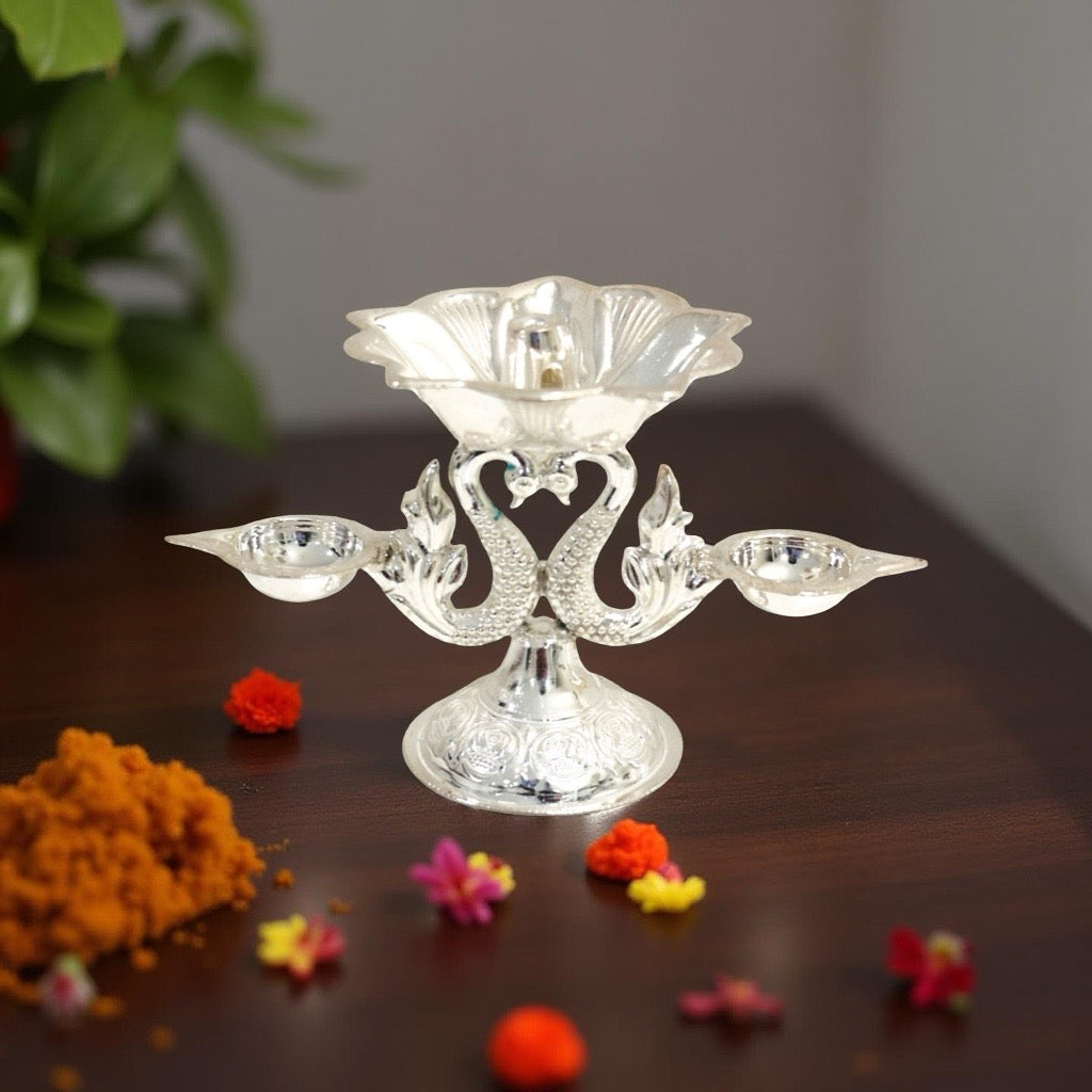 Aarna  Fancy Peacock Silver Diya